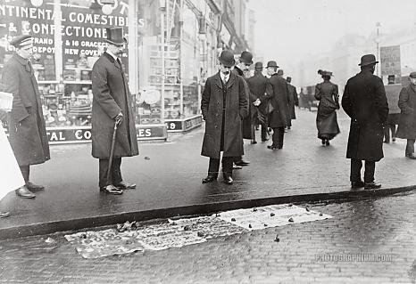 the_english_elections._election_posters_on_the_pavement_in_front_of_a_polling_place._1911-1912.jpg